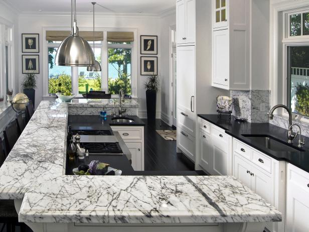 marble kitchen countertop with wall tiles idea