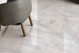 Refinishing marble tiles